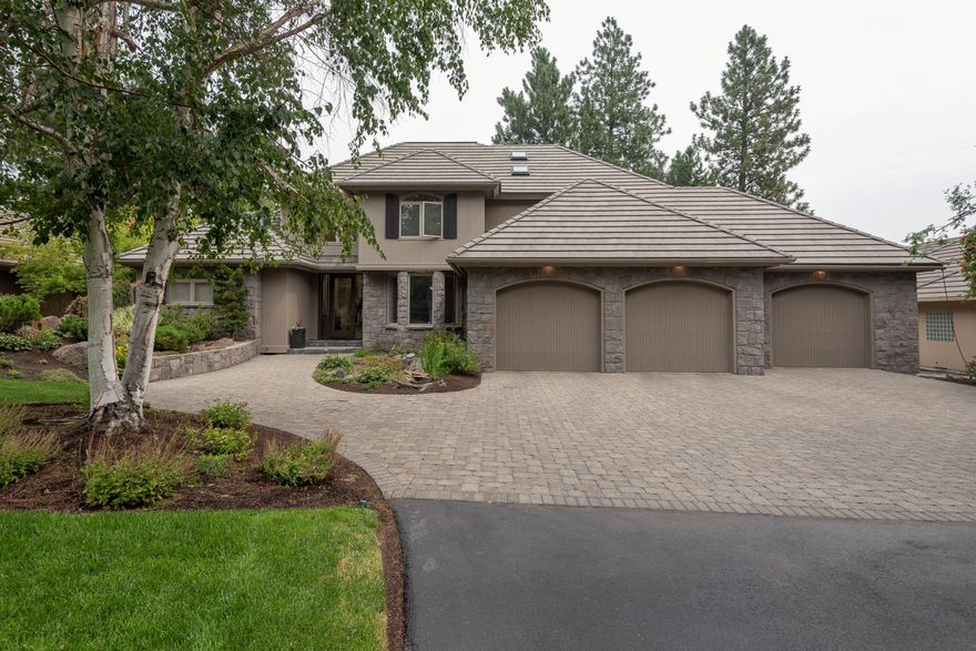 Stunning home with gorgeous curb appeal & mature landscaping located on the 17th fairway of sought after Broken Top. Floor to ceiling windows invite the outdoors in. Entertainers delight with a large paver patio overlooking the pond. Beautifully updated, spacious kitchen is light filled and adjoins a breakfast nook overlooking the course and pond. New quartz counter-tops, new Dacor appliances and crisp white cabinetry make this kitchen a chef's dream. Luxurious main
floor master suite with a stylish new bathroom featuring double vanities, tiled shower, soaking tub and double closets. A spacious office attached to the master
boasts lots of light, built ins, patio access with golf course and pond views. Jr suite plus 2 bedrooms upstairs with a flex room and storage area. Oversized 3 car garage for all your toys. This home is truly a must see!