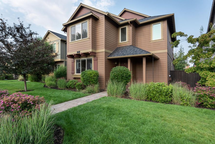 Beautiful well-maintained Pahlisch built home located in desirable Lava Ridges situated across from the 159-acre Pine Nursery Park and Ponderosa Elementary. The home features an open great room with extra flex space off dining area, tall ceilings, hand textured walls, gas fire place with stone surround and built-in shelves. SS appliances, pantry, alder cabinets and hardwood flooring. Spacious primary suite with ceiling fan, lots of natural light, large walk-in tile shower and separate soaking tub. Two well separated guest bedrooms and full bath including a convenient upstairs oversized laundry room with sink, built-in cabinets and counter space. Low maintenance fully fenced side yards and ally-access 2 car garage with plenty of driveway parking. Central Air plus new furnace installed 2021. The HOA includes front yard maintenance, snow removal, club house and pool. Close and convenient proximity to schools, parks, trails, shopping, restaurant, easy access on and off the Parkway.