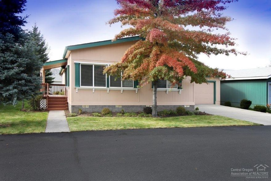 One of the newer homes a 2000 model, 3 bed, 2 bath home deep in quiet Snowberry Village, Bend's Premier 55+ community close to medical, shopping. Large 2 car finished, insulated garage, covered private patio, covered front porch. Open Floor plan. All appliances included inc Washer/Dryer. Central AC. All electric home. New windows, paint, comfort height toilets in 2015/2016, Safe Racks in Garage, Clubhouse, Pavilion, RV storage available. Community activities. Home Warranty included through November 5, 2017