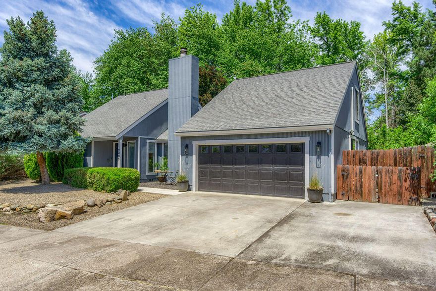 Modern East Medford home with backyard access to Lazy Creek. This home is situated in a quiet neighborhood 1 block from RVMC. Great split floorplan featuring vaulted ceilings, and many updated finishes. Enjoy the clerestory windows, and large wood burning fireplace in living room right off entry. You''ll love the large main suite bedroom with 2 walk-in closets, vaulted ceilings, and separate staircase with privacy. Main suite also includes full bathroom with designer double sink vanity, skylight, vaulted ceilings, backlit mirror with defrost, and soaking tub with shower. 2 bedrooms are on main level with metal designer barn door closets, and 4th bedroom/bonus room is upstairs at the other end of the home with vaulted ceilings, separate ductless heating/ cooling, and 2 large storage rooms. Kitchen with leathered granite, and premium appliances. New paint inside and out, new HVAC/ AC, new roof and extensive understructure work all done. Tour today!