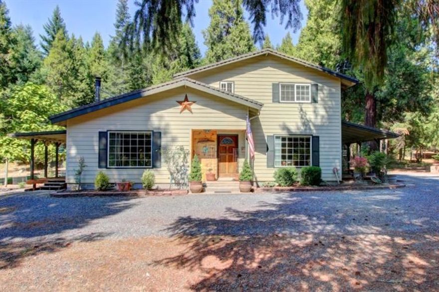 Spacious but cozy 2005 built home on beautiful wooded acreage, just 1 mile from historic Wolf Creek Inn. Vaulted ceilings, lots of wood trim, maple kitchen cabinets, large main-floor master bedroom, 4 decks and extra large utility/laundry room. Mature landscaping, greenhouse, grape vines, fruit trees and plenty of flat space for gardening. Detached 30' x 36' garage with 2- 10' x 10' roll-up doors, with additional shop and storage space in rear. 25 gal/min well per owner, 2014 Flow test available.