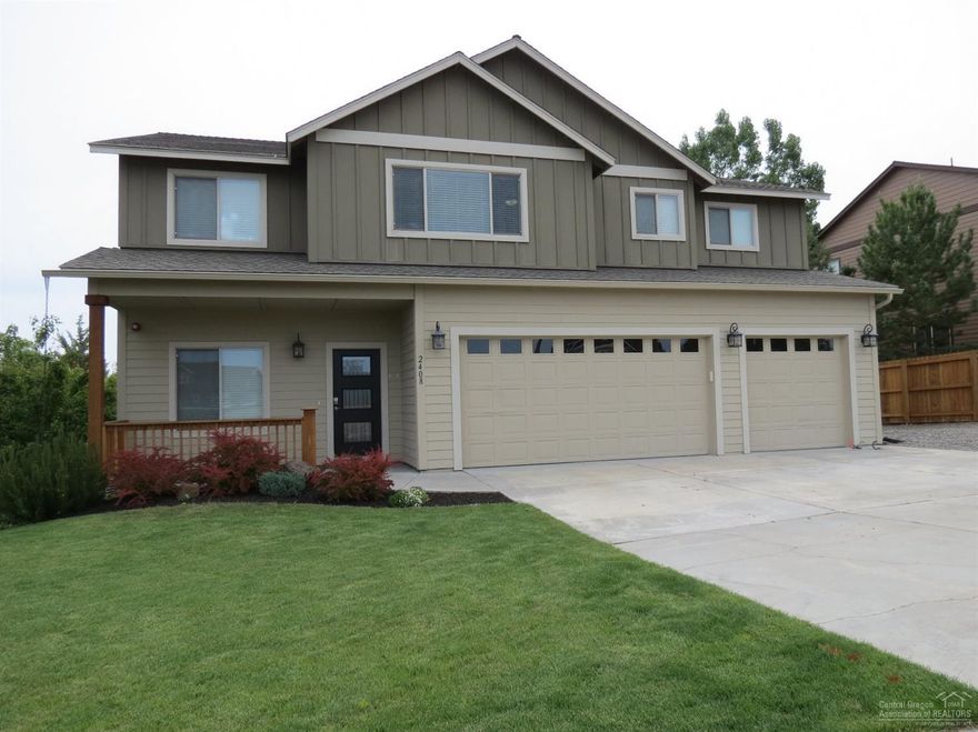 4+ bedroom, 2.5 bath, kitchen has island w/ eating bar, slab granite & tile backsplash that opens to the great room. Upstairs oversized master suite w/ walk-in closet, separate tub, walk-in shower & custom features. Large loft space upstairs. Generously sized bedrooms. Fenced yard w/ beautiful landscaping. Triple car garage & parking area that can accommodate a larger RV. Cascade plus Smith Rock views. Great SW neighborhood w/ easy access to Bend. This home is this a real winner. Vacant & ready to go.