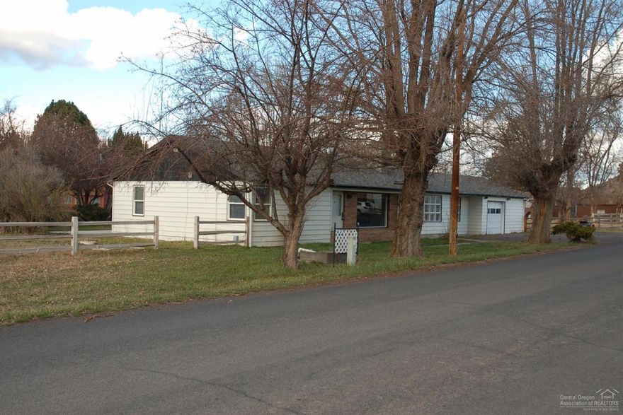Updated home on 1.81 acres with 1.81 acres of irrigation and a shop, close to town. Home has all new interior paint, light fixtures, updated electrical, carpet and vinyl and tile work, granite kitchen sink and jetted bath tub. Back patio is wired for a hot tub. Shop has power, separated garage area and a bonus room above. Sellers are licensed brokers in the state of Oregon.