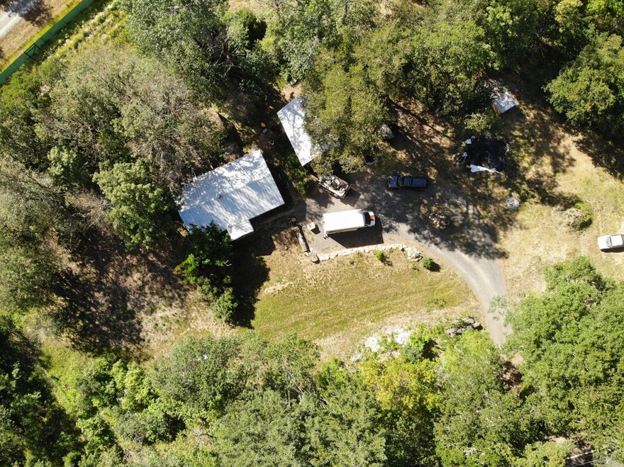 This is a cute cottage built in 1940 sits on 1.46 semi private acres. It is zoned FC which opens up lots of opportunity and has irrigation rights from Salmon Creek. There is a barn with loft. There are two suitable locations for potential crop sites. Seller is willing to include a lot of equipment with suitable offer. Home needs some TLC but is livable!