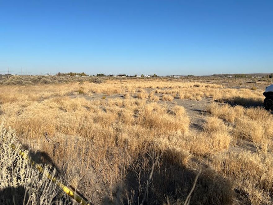 Discover an exceptional piece of buildable land, perfectly suited for residential development. This 2.4 acre lot offers endless potential for your dream home or home away from home. Manufactured home allowed. Nestled in a quiet town, this land features direct road access and beautiful valley views. Great horse property.