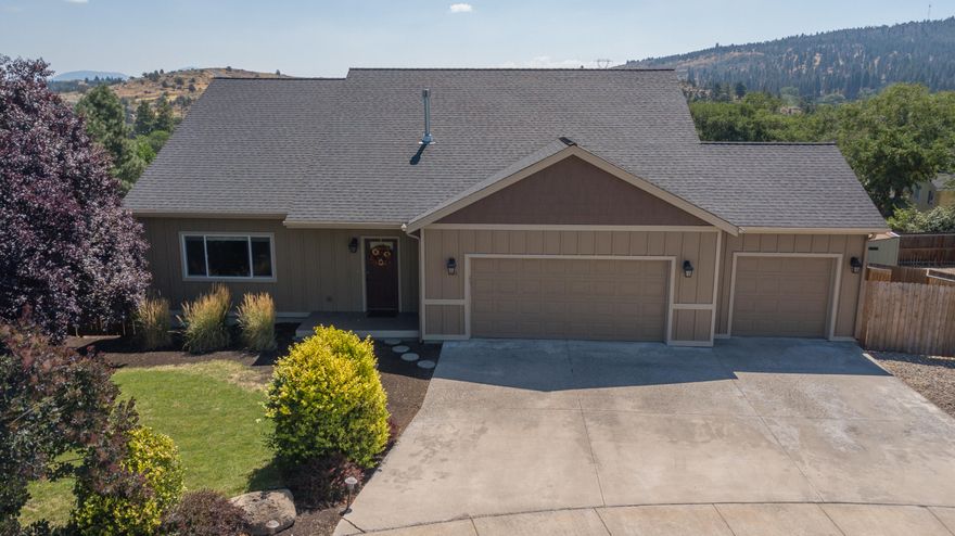 Remarkable view of Link River from Single level Quail Point home. Open floor plan with vaulted ceilings. Beautiful acacia wood flooring, granite countertops, gas fireplace and central A/C. Spacious deck overlooking river valley and sunrises. Additional 1,500 sq ft unfinished basement with separate entrance, Potential ADU. This 3 bedroom, 2 bath with attached 3 car garage is Stunning!