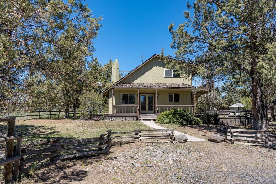 Your opportunity to own 10 acres in the country with privacy and Cascade Mt. Views. Private circular drive leads you to this secluded Tri-level, 1625 Sq Ft home built in 1978 w/ dbl attached garage. Main floor includes; large open vaulted great room with wood beamed ceilings, rock hearth w/pellet stove, kitchen, eating bar, pantry, dining area, utility, large bedroom and guest bath. Vaulted open loft area on upper level with two additional bedrooms, including primary w/ bath and private deck. Unfinished basement area has some framing and wood stove. Fenced and cross fenced, private well, large barn, stalls, hay storage and pens ready for your animals plus intriguing wood shop building w/ loft area, two storage sheds and poultry facility which provide numerous options for a mini farm. Property is two tax lots, potential to build additional dwelling! Buyer's to verify with county. Short distance from town, schools and hospital.