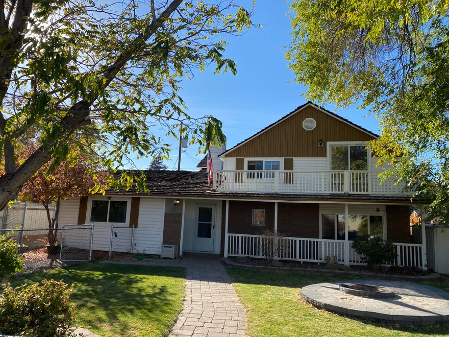 Investor or contractor special or handy first time home buyer, Zoned R3, many opportunities possible. Prime location, blocks from Historic downtown Redmond, restaurants, shopping and 3 blocks from Centennial Park. This charming two story home with a second-level porch has 4 bedrooms, primary downstairs with 3 additional bedrooms upstairs. Primary could potentially be segregated for a STR unit. The home needs a fair amount of work but the bones are good. Large fenced front yard with built in firepit, RV parking.