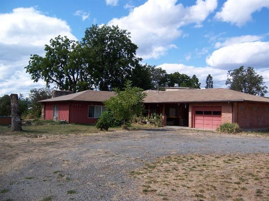 Great location close to town with lots of potential. Large (0.90 acre), level, versatile property with city services, mixed use zoning and convenient access to I-5. Could facilitate a home-based business, adult foster care, professional trade or a contractor and equipment. Potential buyers to do their own due diligence of property uses. Single story, 5 bedroom, 2.0 bath home with approximately 2,526 Sq. ft. with lots of possibilities. Private well, plus city water has been plumbed to the site (water meter has been installed at street). Come check it out.