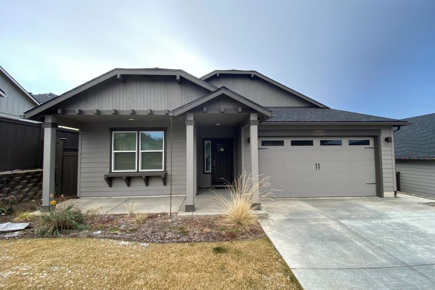 This single level home is conveniently located near schools, St. Charles Hospital, shopping and the hub of Bend. A remodeled design allows extra light and sliding door access out to the large fenced yard. The kitchen features quartz counters, GE Stainless appliances, a large pantry and counter seating. The primary suite has a fabulous bath with soaking tub, double vanities, large walk-in closet and separate WC. 2 bedrooms towards the front of the home share a full bath. The garage leads into a laundry/ mud room with sink. The backyard is gorgeous with extra landscaping and an extended patio, including an elevated perch to enjoy mountain views! Live easy and in style right here in the newer Leehaven community.