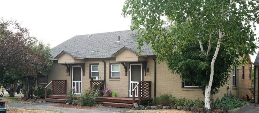 Investor Opportunity! This in-town triplex is a turnkey income-producing property, perfect for both first-time investors and seasoned portfolio builders. All three units are currently rented with stable tenants in place, offering immediate cash flow. Low-maintenance and well-maintained, this property is situated in a convenient location close to amenities, schools, and public transportation. Whether you're looking to start your investment journey or add a solid performer to your portfolio, this triplex is a smart move!