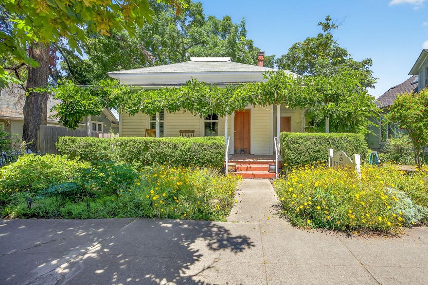 A rare opportunity located in Ashland's beloved Railroad District! This charming & versatile property offers 3 separate units just blocks from the Co-op, OSF, & downtown Ashland. Lovingly maintained, the property blends timeless character w/ modern functionality & includes newer sewer & water lines, electrical panel, & window coverings. The main unit offers a spacious 2-bedroom layout w/ stunning wood accents & built-ins throughout.  The kitchen is conveniently located next to the dining area & has its own laundry facility. Unit #2 is a 1-bedroom apartment w/ a galley kitchen + great natural light. Unit #3 is a charming studio. Large fenced yard w/ mature landscaping, garden space, deck + 4 alley off street parking spaces. Whether you seek a primary residence with added flexibility, a multi-generational layout, or a unique investment opportunity, this one-of-a-kind property is full of potential. Buyer to perform their own due diligence regarding permitted uses and future possibilities