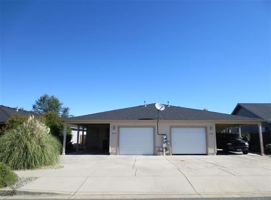 DUPLEX! Great time to invest in your future; featuring these 2 bedroom, 2 bath units with 1,127 s.f. per unit. Built in 2004 and are very well maintained. Kitchen with all appliances; laundry room with pantry. Large great room with vaulted ceiling and slider to the patio. An attached one car garage with opener and 1 car carport. Low maintenance landscaping on .16 of an acre. Take a look today.