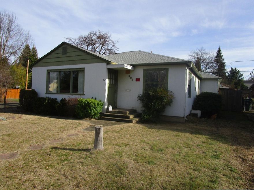 Excellent location! Close to shopping, hospitals, transportation, downtown, public library and RVCC. Corner lot allows for off street and some R.V. parking. Fir flooring under carpet. Has been used as a rental investment property for the last couple of years. Each room was rented out for $400.00 per month. Selling as-is.