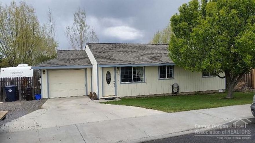 Cute!Cutest house in the whole subdivision. Nicely decorated 3bd/2ba home. New floor coverings inc Pergo laminate & tile w/radiant heating. There is space to park your RV plus an 8X10 storage shed. The yard is landscaped inc sprinklers, beautiful shade trees, garden area, water feature & a fenced backyard. Close to park. Kitchen has been upgraded w/stainless steel appliances, granite tile counter tops w/ceramic tile & glass back splash. Master bath has been finished so nice you are going to want to see this