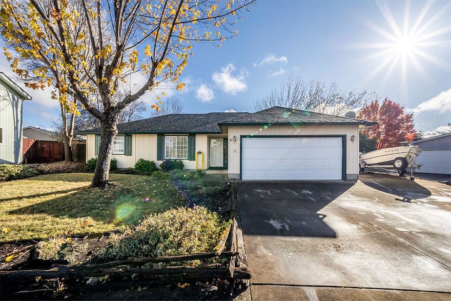 This gracious, single store home is MOVE IN READY! 3-bedroom, 2 bath home in a quiet, established neighborhood convenient to schools, shopping, and the Eagle Point Golf Course! Open concept floor plan with lots of windows to enjoy the amazing natural light throughout as well as the beautiful outdoor surroundings. Large, open kitchen with a walk-in pantry, abundant storage, and a dedicated laundry room with built-in cabinetry. Master bedroom with separate shower area and walk-in closet plus a dining area open to the living room, kitchen, and back patio. Perfect for Entertaining! Fully fenced, mature, easy care landscaping and a covered back patio with ceiling fan. 2-car garage with room for storage, a HUGE RV parking area, and a roomy standalone shop, studio, or storage building for all your toys. A Must Tour!