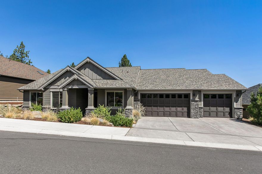 Price Improvement- This single level Pahlisch built home backs to the 1st tee. Large living room windows overlooking City and Smith Rock views provide lots of natural light, yet the sun never hits them directly. Vaulted coffered ceilings, floor to ceiling rock fireplace. Stunning entrance with built in bench. Engineered hardwood flooring in the main living areas plus the primary bedroom. Brand new carpet in the guest bedrooms. Full guest bath with walk in shower. Textured walls, large linen closet. Chef kitchen with double wall ovens, built in microwave, quartz countertops, soft close drawers, under mount sink, eat at island. Large pantry. Built in desk. Ceiling fans. Primary bedroom on-suite is separate from the other rooms and has a soaker tub, tiled walk in shower, private water closet, double vanity, oversized walk in closet. Storage Galore! Triple car garage and easy care landscaping. Close to the Deschutes River and trails plus an off leash dog park. www.futureofriversedge.com