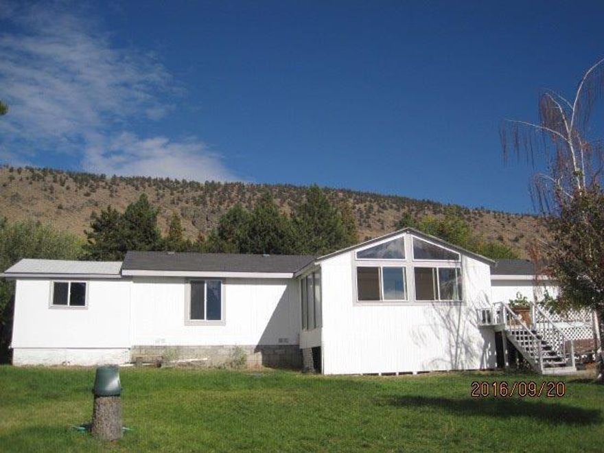 Nice 3 bedroom, 2 bath home with great views of Mt. Shasta. Peacefully located at the end of a quiet street, on over an acre, surrounded by mature trees for privacy. This home features a great split floor plan with a large master, and walk-in closet. Kitchen is open to the dining and living room. Updated kitchen counters, vinyl floors, and some appliances. Newer interior paint, vinyl windows, and an updated vanity in the guest bath. Off the living room is a finished sun room that you can enjoy year round. Lets not forget a cozy wood stove for the colder months. Detached 2 car garage with 220v wiring and workshop in the back. Additional storage or hobby room off the side of the home as well. This home allows for country living close to town. Enjoy the fully fenced orchard with a variety of apple, pear, plum, peach, nectarine, almond, and cherry trees, plus a blueberry bush, and delicious grapes. There is also a fenced garden area, chicken coop, and the property perimeter is fully fenced