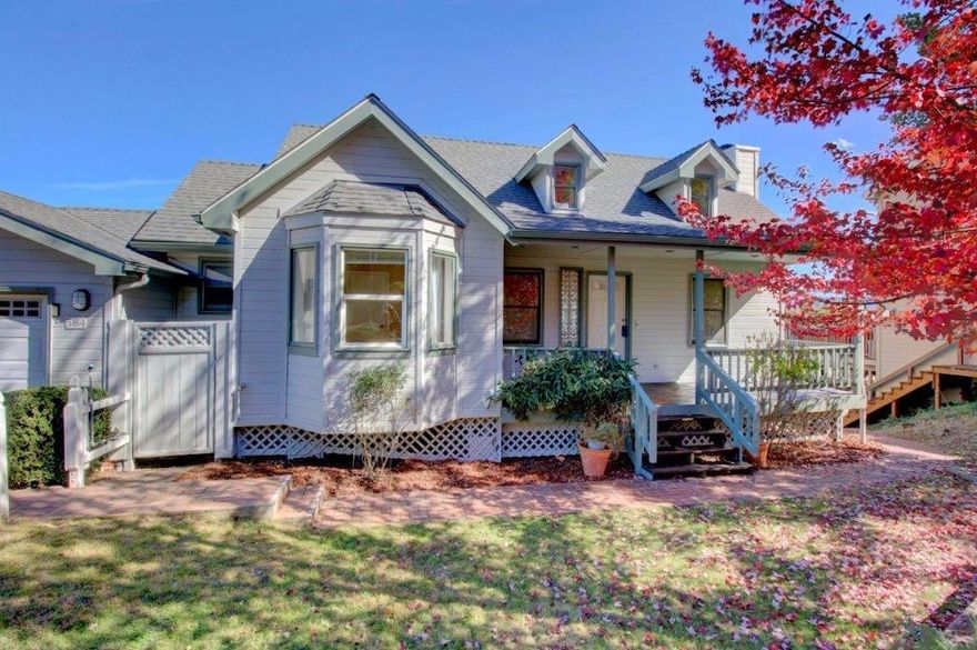 Just Reduced $10,000: Fabulous Contemporary Custom-Built Ashland Home w/Spectacular Views of the Valley! Remodeled in 2006 with so many upgrades & extras we couldn't begin to list them all. Huge lot w/beautifully landscaped front & back yards w/timed sprinklers. 4 bedroom, 3.5 baths w/brand new carpet, upgraded laminate & tile floors, some new interior paint, newer exterior paint, new roof in 2011, extremely energy efficient & gorgeous unobstructed views from nearly every room. Light & bright floor plan w/large living room, wood burning fireplace w/custom mantle, spiral staircase leads to a private loft area, kitchen w/stainless steel appliances, formal dining/office, bath, breakfast nook, indoor utility room, 2 levels of recently stained wood view decks, covered front porch w/newly stained wood & oversized finished 2-car garage w/built-in shelving. Lower level hosts additional bedrooms & baths and huge master suite with 2 pedestal sinks, walk-in closet & slider to the lower deck.