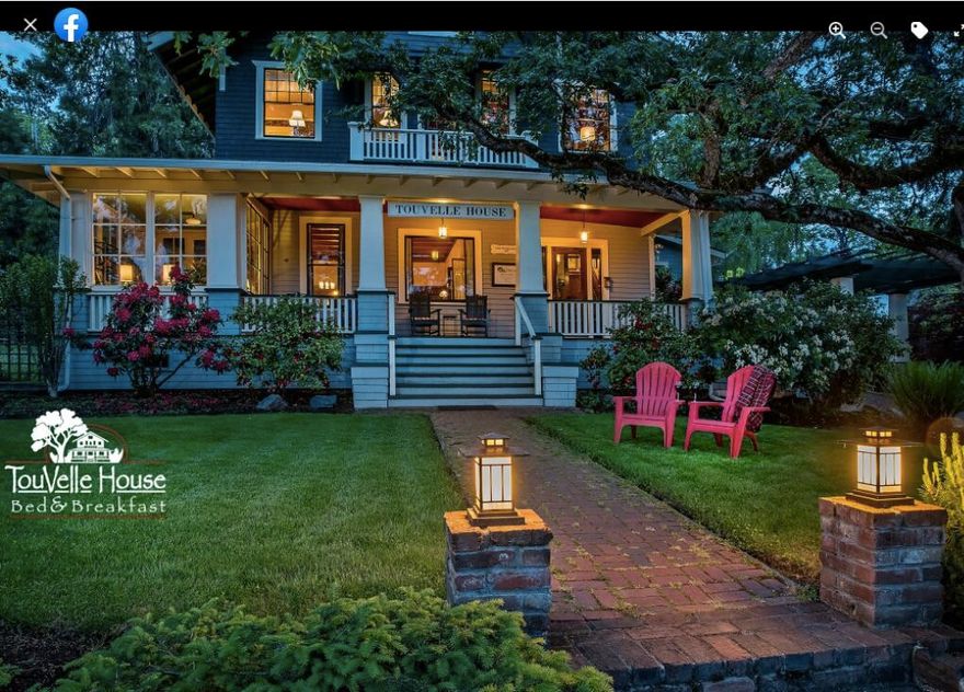 The Historic TouVelle House is nestled in the heart of Jacksonville Oregon's
Historic District, a National Historic Landmark & one of the nation's top 10 small towns. This 1916 craftsman-style estate sits on over an acre of landscaped
grounds w/lush gardens & trees. The boutique Inn offers 7 bedrms & 8 baths, as
well as a main floor great rm, formal dining w/ a built-in buffet, glass-filled sunroom, cozy library, & an updated kitchen w/granite counters, dbl wall ovens, & sub-zero fridge. The luxurious grounds include a saltwater pool w/ multiple seating areas, hot tub, sauna, wrap-around covered porches, a garden w/ raised beds, a large barn, water feature, & bocce court. Dedicated parking allows easy access to the Inn. The Inn's tradition of excellence can be leveraged to attract new clientele or expand the wedding/event venue, thanks to its exceptional hospitality & glowing reviews from guests. Whether as a grand private home or a successful business, don't miss this opportunity!