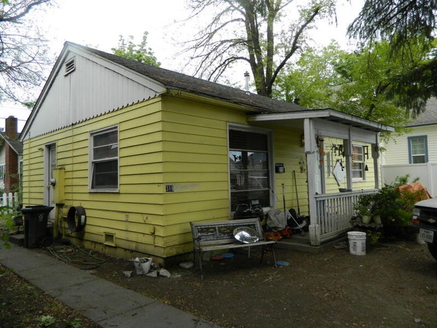 Two single family residences located upon one home site.  The front unit (316) has two bedrooms and one bath with a total of 816 sf of living area. The house at (318) consists of one bedroom and one bath with a total of 572 sf. The front unit has an updated bathroom and has been adequately maintained throughout the years and is in generally good condition. The rear house has received very little updating and has some damaged ceilings throughout.  The houses are approximately 75 years old. Houses are sold AS IS with not repairs.  Owner will not carry.