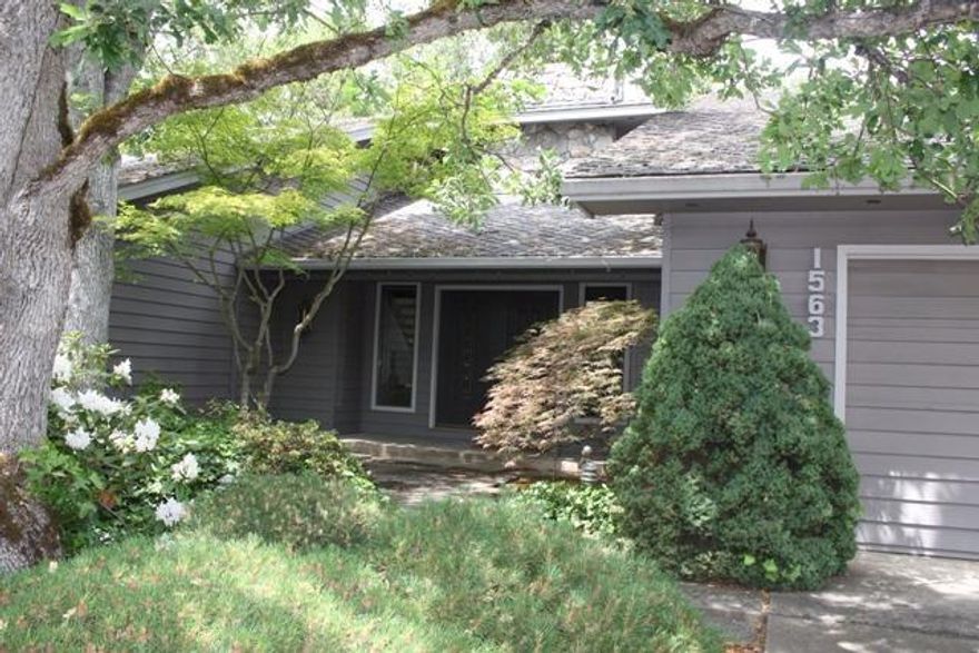 Desirable East Medford location with over 3,000 sq. ft. 4 bedrooms 3.5 baths with unique floor plan and set up. Over 1/3 acre lot. If your searching for shop and garage space this is it.(garage space for 6 cars) Also, covered RV parking. Private back yard with large deck and beautiful mature landscaping. Floor to ceiling rock fireplace. Huge main floor master with walk-in. Needs updating, but the floor plan and immaculate condition of the home make it a great buy. Custom built!