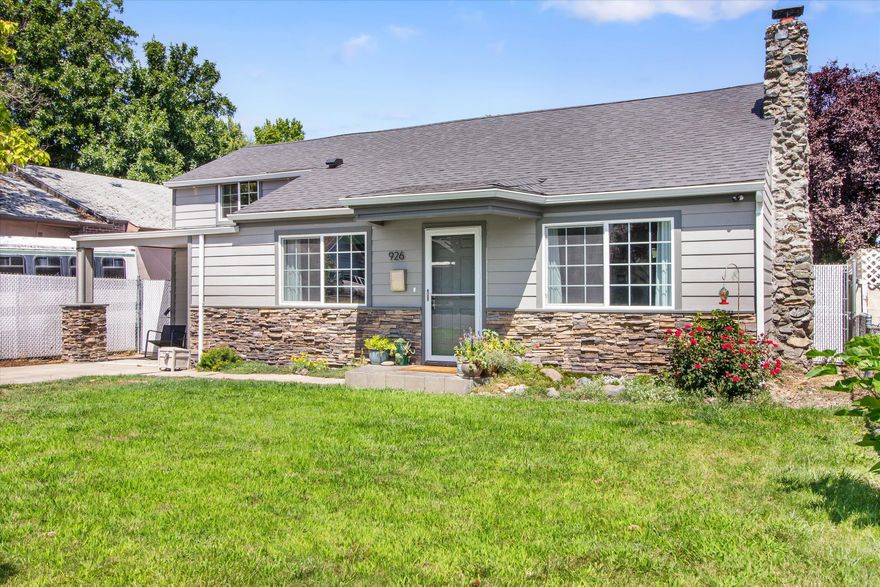 This home is anything but cookie-cutter! If you're looking for charm, incredible outdoor space, and a completely custom layout filled with unique touches and maximized functionality, this is the one for you. Beautifully updated and thoughtfully designed, this home is a true gem! Stunning chef's kitchen features sleek finishes, a walk-in pantry, and comes with all appliances. Offering 3 spacious bedrooms, 2 full bathrooms, plus a versatile bunk room, every inch of this home has been carefully utilized—from clever storage areas to a cozy reading nook and bonus living space.  This home offers tons of natural light with abundant windows, skylights, and French doors.  The hardwood floors and tiled fireplace in living room provide warmth and character.  Sitting on a large lot, the exterior offers alley access with RV parking, 50-amp hookups, and fenced garden with raised beds. Located near shopping, restaurants, and public transportation, this home has it all - style, space and convenience!