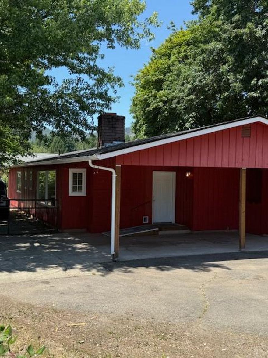 This property offers 4 bedrooms, 2.5 baths on a good sized corner lot with detached garage/shop, all conveniently located close to all the amenities of downtown Cave Junction. Very competitively priced.