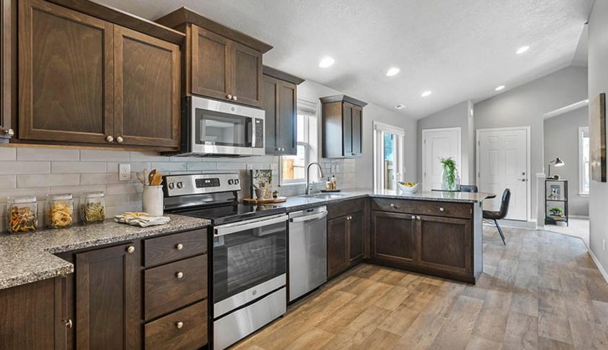 The Austin is a comfortable, efficient home with a lot of soul. The great room is perfect for gathering the family and relaxing, yet open to the dining area for a nice flow of conversation. The bright galley style kitchen has plenty of cupboard storage and counter space and generous overhead lighting. The functional breakfast bar opens up into the adjoining dining area. Every inch of this floorplan is inspired by your modern, social lifestyle.

The comfortable master suite boasts its own private bathroom and two ''his and hers'' closets for those who like their own space. The additional two bedrooms, are equally sizeable and share the second bathroom with a full tub. One of the bedrooms could easily be converted into an office or den. A separate laundry room leads to a two-car garage with room to store cars, gear and equipment.