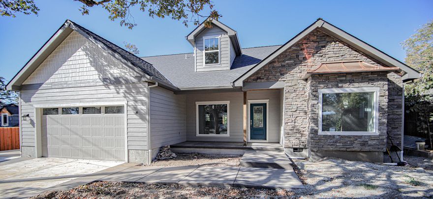 If you are looking for a newly built home, you will not want to miss this special offering! This beautifully designed 2300 square foot home w/exceptional exterior, and interior is just nearing completion. Elegant 3 bedroom, 3 bath home, with open Great Room, Dining Area and Kitchen that enjoy the warmth of the fireplace & high ceilings.  With quartz counter tops & a great island with lots of cabinets, you'll enjoy cooking in this fabulous space.  Beautiful master bedroom suite with lovely bath including separate shower, sunken tub & walk in closet.  Lots of storage, and big windows for natural light are just a few of things you will fall in love with throughout this well designed home.  Wood flooring throughout, nice front porch, & French doors lead to the private deck surrounded by pretty plants and easy care landscaping. Finished two car garage & huge cement slab for parking that RV! This home is a true must see!