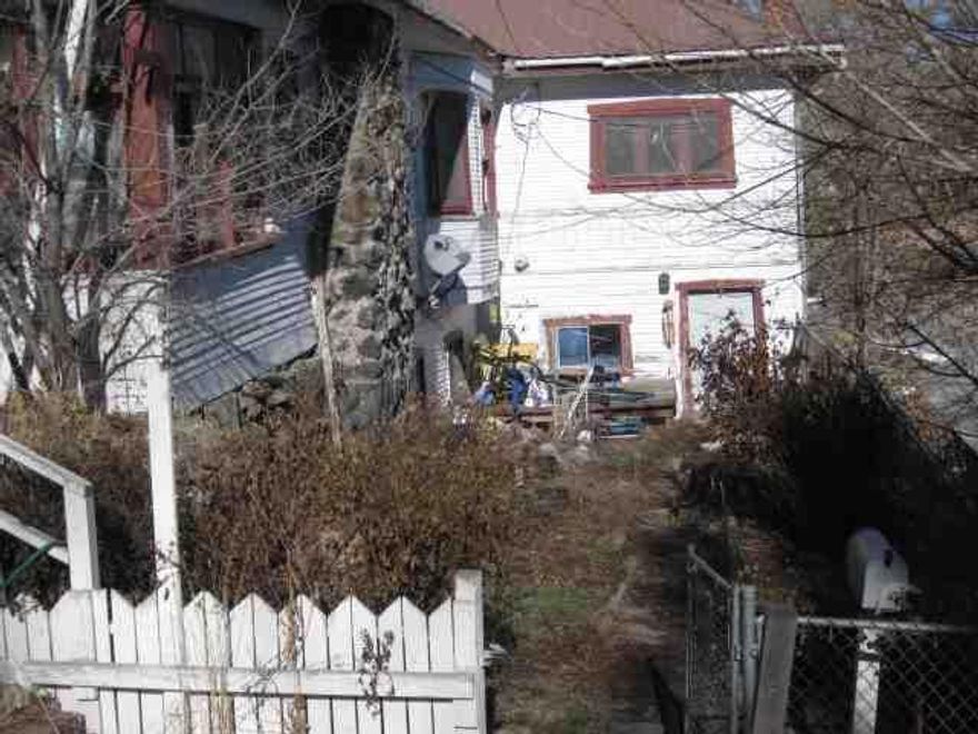 Minumum $1,000 Earnest Money Deposit Required On All Offers. Also, Offers Must Include Seller's as Is Addendum (Obtain From Listing Agent). Property Is On Hillside. Main Unit Has Lots Of Old Time Charm. Call Agent For Details.