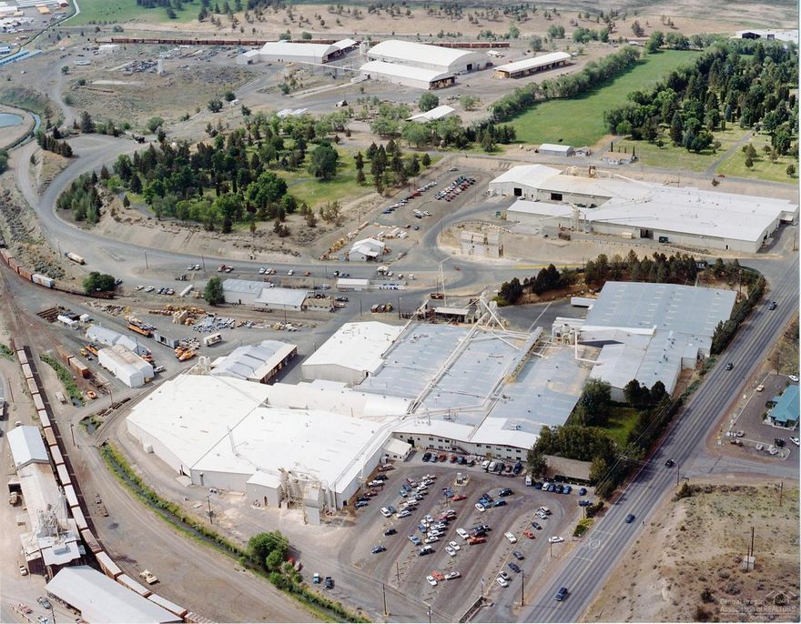 This is a great long term investment opportunity with a large manufacturing facility in Prineville Oregon. Contact Industries, which has been in business for over 70 years, recently executed a 20 year absolute NNN lease on this 82 acre complex with approximately 555,000 square feet under roof. Contact Industries is currently paying $480,000 annually and there are annual escalations ranging from 2-3%. The facility was built in 1955 and was extensively remodeled from 1998 to 2008.