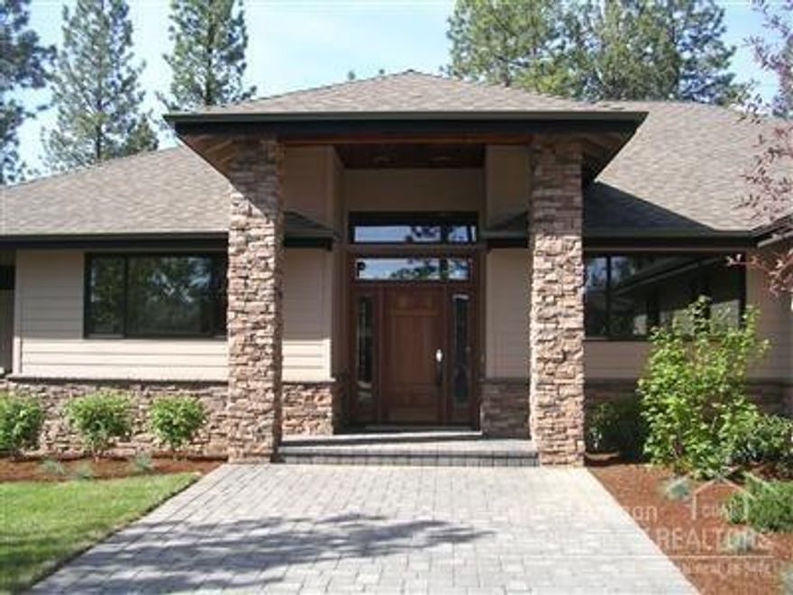 Hard to find single level home nestled among mature Ponderosa Pines in Shevlin Ridge. This custom built 3107 sq. ft. home has 4 bedrooms 3 with private bathrooms, plus office. Huge open great room + separate family room. Gourmet kitchen with granite counters & high-end appliances. Quality finishes include solid cherry doors, Pozzi wood windows, Cherry cabinetry, tile & hardwood flooring & much more. Located on a rare, large, .45 acre flat lot. Huge 4 Car Garage. Just Beautiful!