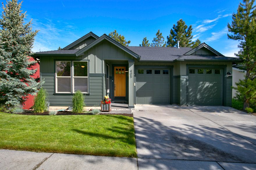 Spacious updated home nestled in the heart of Bend's Westside. Just steps from your front door enjoy mountain biking/hiking trails, shopping & dining, Discovery Park & more! The open concept floor plan lives large with tall ceilings, expansive living areas & abundant natural light throughout. Main-level living features a large updated kitchen, high-end appliances, a great room with lovely views of large Ponderosa Pines & a luxurious main-level primary suite with access to outside covered deck, dual vanities, walk-in closet & stylish dual-headed tile shower. On the lower level you will find a second primary suite with gas fireplace, family room with gas fireplace, office or guest ensuite, wet bar with dishwasher & wine fridge, second laundry area, large deck & separate entrance. Entertaining is easy as the sliding glass doors seamlessly integrate the indoor & outdoor living areas. Kick back & relax in the quiet, fully-fenced backyard with mature Ponderosa Pines, garden & fire pit.