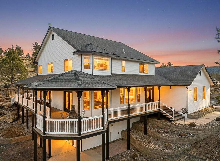 Stunning home sitting on 1.10 acres in Sunset Hills neighborhood. Unique multi-generational living opportunity, plus a shop! Greeted by the large wrap around deck, walk into this home featuring 4,498 sqft, 3 bed, 3.5 bath, vaulted ceilings and tons of natural light. Large Kitchen with walk-in pantry. Family Room with cathedral windows, cozy fireplace and access to the back deck with calming pond and water feature. Spacious Primary Bedroom on the main floor with walk-in closet, large bathroom featuring jetted soaking tub and tiled shower. 2 bedrooms, full bath, loft/office upstairs. Downstairs from main level is a fully finished basement with full kitchen, 2 rooms, full bath and living room space.  Private exterior entrance and can be closed off from the main house. New exterior paint, wrap around driveway with new asphalt, new true 2 car garage door to the main home. Nice size shop with loft/workspace area on the 2nd level. All you could ever want and more is right here!