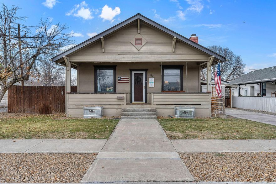**Charming Home** in a prime location, just minutes from downtown, schools, and parks. This delightful 2-bedroom (with potential for a 3rd) offers a perfect blend of modern updates and classic charm. Step inside to discover original hardwood floors and tall ceilings that create an inviting atmosphere. The updated kitchen features stunning granite counters and ample storage, ideal for culinary enthusiasts. Enjoy outdoor living in the fenced yard, perfect for pets or gatherings. Relax on the covered porch, sipping morning coffee or unwinding after a long day. This property is not just a home; it's a lifestyle, combining convenience and comfort. Don't miss the opportunity to make this charming residence yours!