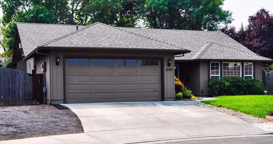 This is a beautiful, well maintained home located on a cul-de-sac in the Lone Pine area of East Medford. Inside the home you will find wood and tile floors, granite counter tops, a new microwave and gas stove, a fireplace, vaulted ceilings and a pass through window from the kitchen to the family room as well as an upstairs bonus room! Outside there is extra deep RV parking, a beautiful back yard with two flag stone patios, a rock fountain, mature landscaping, hot tub. Call today to schedule a showing!