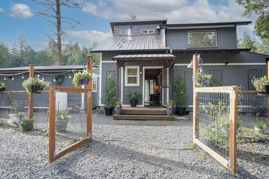 Looking for a one of a kind OFF GRID property? This Sunny Valley homestead offers a remodeled cabin, brand-new kitchen/bath house on 59.85 gorgeous, secluded acres are waiting for you with limitless possibilities! The cabin offers one bedroom w/ built in closet area & a separate loft that can fit an additional bed. The kitchen/bath house offer a tub/shower combo, portable toilet & full size Frigidaire/GE appliances. Enjoy your outside private oasis that offers fenced garden areas with drip systems installed, an orchard with multiple fruit trees, 1,200 feet of a year-round creek with two swimming holes.