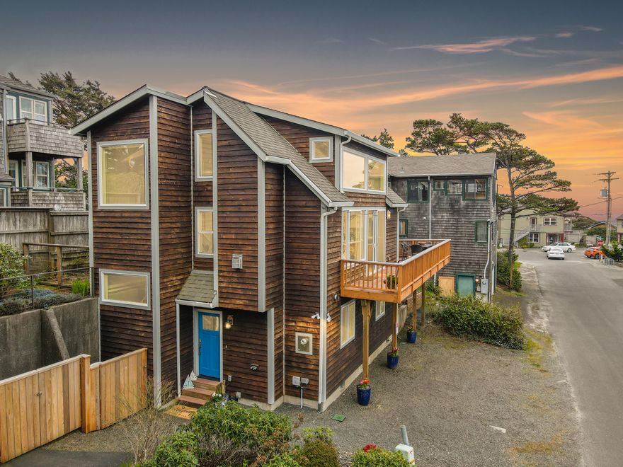 Charming Manzanita Beach house custom built by renowned builder KFR Construction, located just a block to downtown and the beach! Stunning contemporary home with Cape Cod flair. Located within the short-term vacation rental zone and STR is ok! Three bedrooms, plus a private sleeping loft w/attached bathroom and a closet, complete w/ocean views! Gourmet chef's kitchen w/granite countertops, custom cabinets, & stainless-steel appliances. Vaulted ceilings through kitchen, dining, and living room w/natural light. Spacious Trex deck for entertaining, as well as a fenced-in low maintenance yard space. Lovingly cared for and ready for new owners! Fresh interior paint and carpet, generator and hot tub pre-wiring. Rare opportunity.