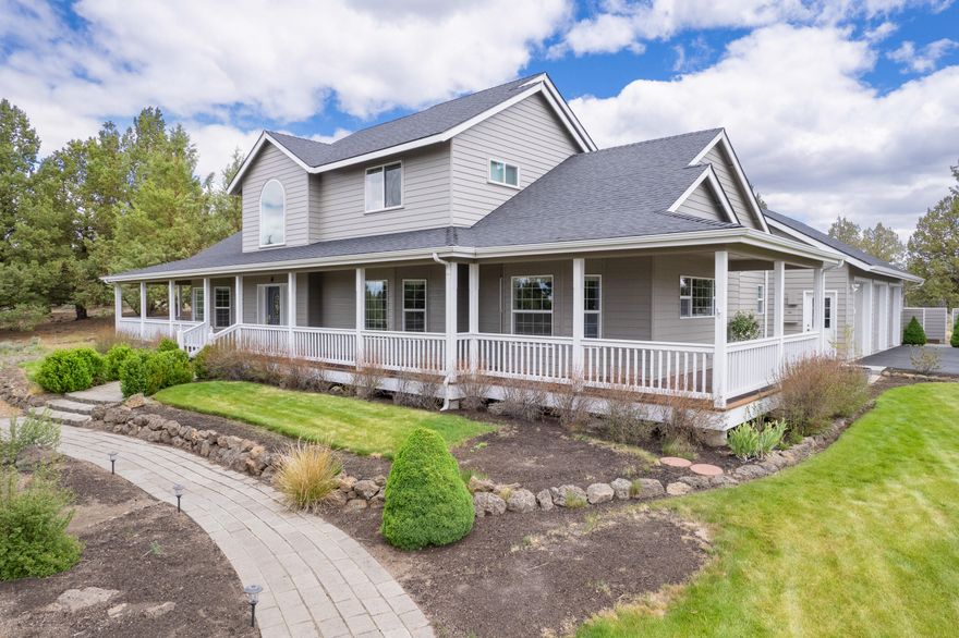 Charming 3-bedroom, 2.5-bathroom, 2,778sf home on 2.48 acres in the highly sought-after Lane Knolls neighborhood. Enjoy 220 acres of communal area, a variety of wildlife, five miles of paved walking trails & stunning Cascade Mountain Views. Main level offer Georgia yellow pine hardwood flooring throughout, a cozy family room with fireplace & built-in cabinetry and abundant natural light. The sunny updated kitchen offers Quartzite counters with tiled backsplash, induction cooktop, double ovens, and pantry with pullout drawers. Additional features on main level include a spacious office/work out/flex room and ''Parlor'' where you can cozy up with a delightful book and cup of tea. Upstairs has two additional bedrooms and bonus room with plenty of storage throughout . Step outside to the covered wrap around porch, & covered back deck, water feature, storage shed adjacent to the 3-car garage, established xeriscape landscaping, raised garden beds & 15-zone auto programmable sprinkler system.