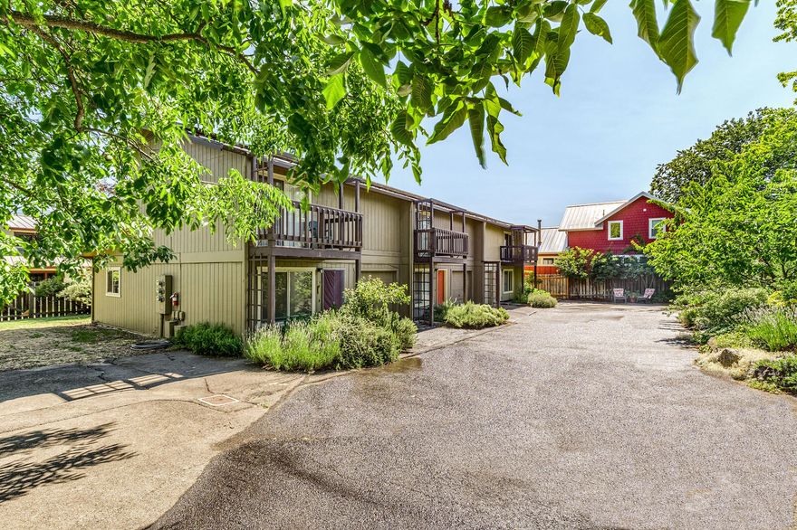Fantastic investment or purchase as owner occupied with amazing rental income! Enjoy the mountain & valley views from all directions & one of Ashland's best locations, just 4 blocks to the downtown Plaza, Lithia Park, Oregon Shakespeare Festival & shopping galore! Each unit includes 2 bdrms, 1.5 baths. All units offer private fenced back yards (a place to entertain dinner guests), extensive passive/active solar systems for power with City credits, 3 garages. Separate water, electric & gas meters. 180 Van Ness has a gas stove fireplace.  Large master suites with walk-in closets, balconies offering morning sun, views of Siskiyou Mountain Range & a second upstairs bedroom(or home office) with views of Grizzly Peak. This triplex is located on a flag lot which offers a secluded, serene, sanctuary like-oasis off the main road. Beautiful & abundant, organic permaculture with persimmons, apricots, cherries, peaches, plums, Italian prunes, asian pears, almonds, walnuts & thornless blackberries