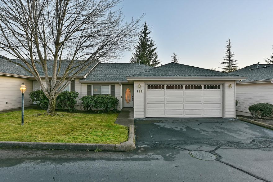 Recently updated and well maintained, cheery and bright single level 2bedroom/2bath home. This cute and clean home is located in desirable E. Medford 55+ and older living community, overlooking the beautiful and serene Quail Point Golf Course. Inside you will find vaulted ceilings and hardwood floors along with corian kitchen counters, and the perfect, cozy gas fireplace in the living room. Master bedroom complemented by coffered ceiling, walk-in closet and step-in shower. Abundance of storage found both inside home and in 2 car garage. Outside you will find a covered patio overlooking the golf course with yard care and exterior maintenance provided by HOA. Newer gas furnace and A/C unit as well. This is a lovely, low-maintenance house to call home!