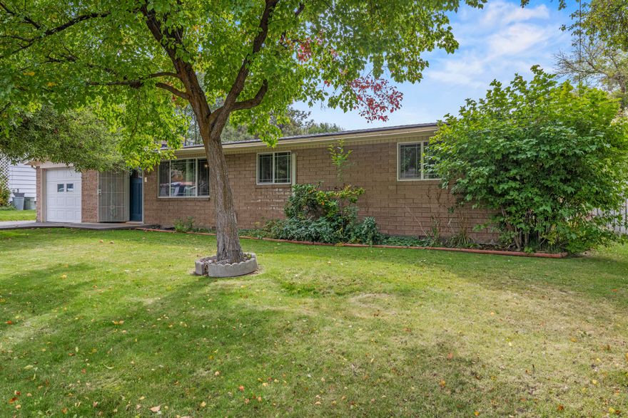 Discover timeless comfort and modern upgrades in this beautifully maintained 3-bedroom, 1.5-bath
residence set in a desirable quiet neighborhood. A newly built roof (2024) pairs effortlessly with
thoughtful updates throughout, including stainless steel appliances, windows, and even a water heater
all updated in 2021—ensuring this home is as reliable as it is refined. The versatile great room
provides endless options—ideal as a home office, playroom, or turn into a primary bedroom—adding flexibility to
meet your lifestyle needs. Outdoors, enjoy a nicely sized backyard with plenty of room to relax or
entertain, while the apple trees in the front yard offer shade and a welcoming touch of charm. The
backyard shed provides added flexibility—repurpose it into a workshop, or tear down to expand your
outdoor living space or create RV parking. This home blends comfort, and opportunity in perfect harmony.