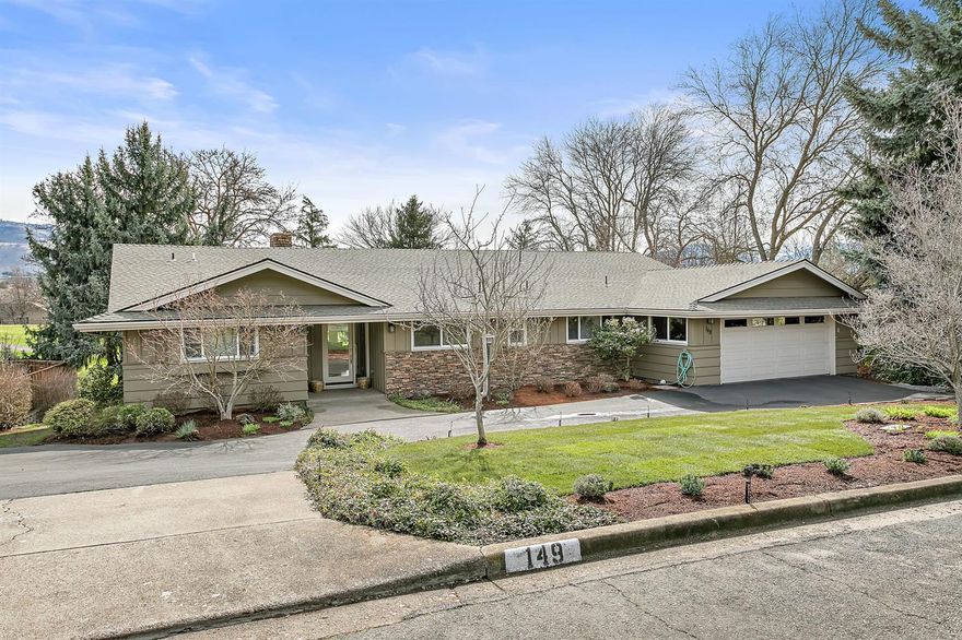 Overlooking the 12th fairway of the Rogue Valley Country Club sits this beautiful contemporary ranch style home. Completely remodeled in 2008 w/ quality materials and amenities throughout. Well-designed floor plan w/ over 3,000 square feet, 3 bedrooms and 3 bathrooms. There are large skylights for natural light, beautiful cherry wood floors, large open kitchen w/ professional series stainless appliances, granite counter tops and center island w/ breakfast bar. Main floor master bedroom en-suite has double vanities, huge walk-in closet, fairway views and deck access. Lower level is set-up nicely for guests, w/ family room, wet bar, bedroom and full bath. Great house for entertaining or just the tranquility and enjoyment of everyday life in a desirable quiet neighborhood. Large covered deck. Lots of storage areas, including a place to park a golf cart. Wonderful place to call home!
