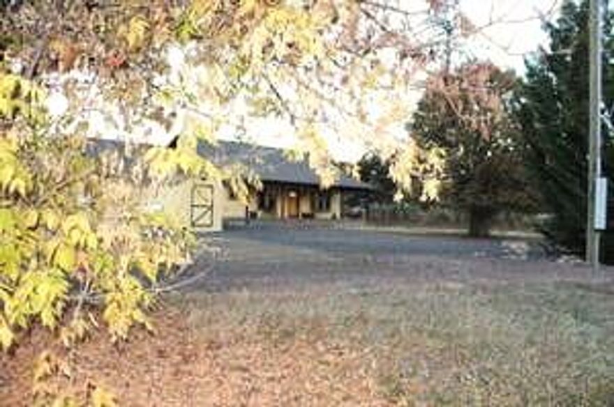 Please come see this comfortable, well-built 2 bedroom 1 office and 2 bath ranch style home. It is located on 2.75 acres in a rural area of Shady Cove/Eagle Point.

It offers French doors that open off the kitchen to a sun porch that includes an operating wood burning cook stove and is plumbed for a sink. Master bedroom/bathroom suite includes indoor jacuzzi room with shower (you bring the jacuzzi) Heat pump & two water heaters assist with any comfort needs for a large family. 

The attic area is great for storage.R49 insulation is in ceiling & Interior walls are insulated. 

Located directly next door on this property is a 3 room office with kitchenette & attached single car garage. Behind is fenced garden area.

Please take time to visit all the advantages of this ideal rural setting. Did I mention that there is an enclosed shop and roomy covered enclosures for RVs or other toys? You are only a couple miles from Shady Cove & Rogue River.