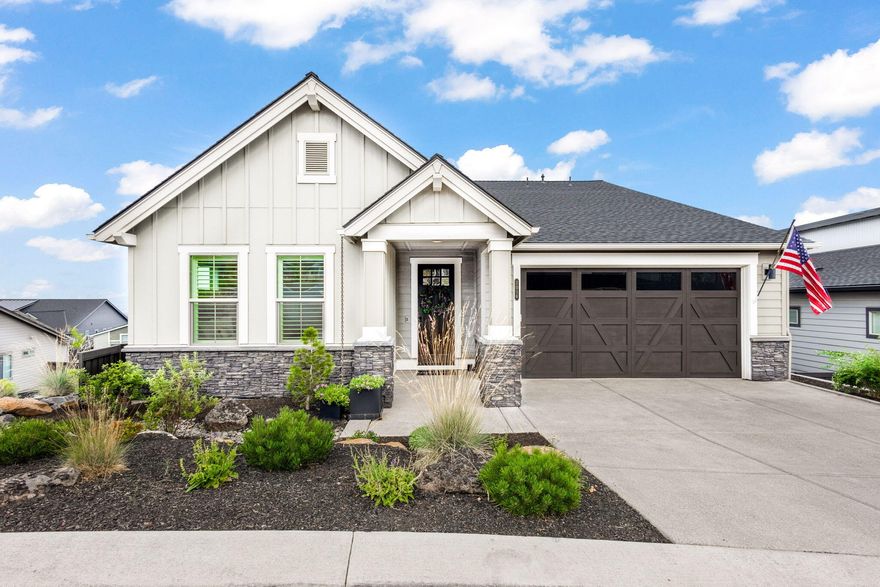 Experience luxury living with the Wentworth floor plan by Pahlisch Homes, an Award-Winning builder. Nestled on Bend's sought-after northwest side, this home offers stunning easterly views, providing a perfect spot to enjoy Pilot Butte's fireworks. Enjoy easy access to Bend's best amenities, including the river trail, shopping, and Sawyer Park. Designed with exceptional craftsmanship, these homes feature premium details like 8-foot doors on the main level, custom built-ins, and smart home technology. Spanning 2,149 square feet, this single-level residence is bathed in natural light, highlighting a chef's kitchen, dining area, and an inviting great room. The primary suite serves as a serene retreat, complete with a spacious walk-in closet, a luxurious tile shower, dual vanities, and a soaking tub. With impeccable quality and finishes, this home is sure to impress.