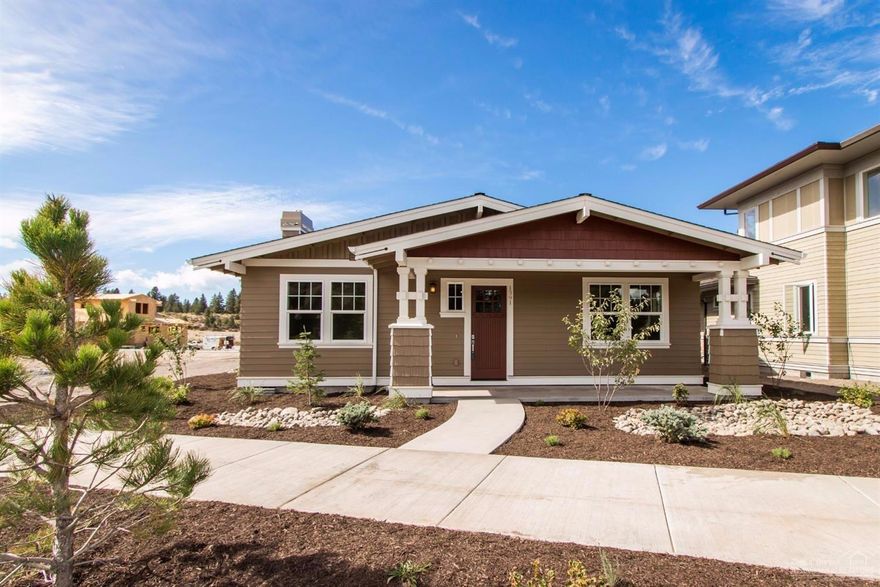 This Craftsman style cottage in NorthWest Crossing combines convenience with style. One of two guest bedrooms on opposite sides of the large foyer is suitable as an office. The foyer opens into a great room with a vaulted living area. The kitchen features an island/breakfast bar and opens to a rear patio. The centrally-located master suite features a vaulted master BR and dual vanity sinks and a tile shower in the bath plus a large walk-in closet. Lovely finishes throughout add pleasure and eye appeal.