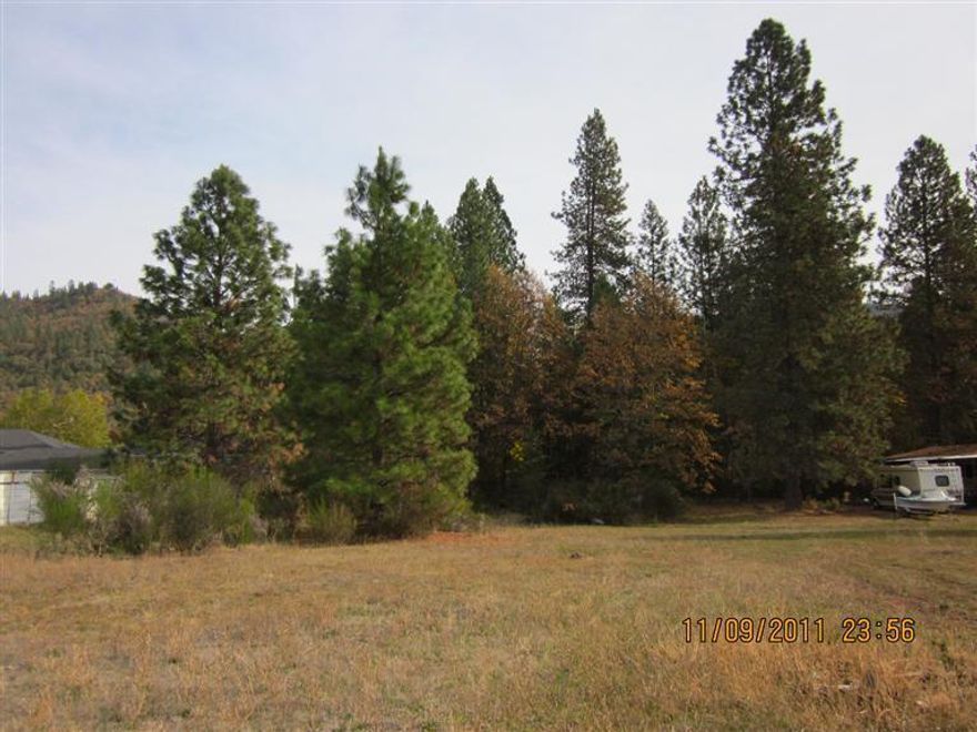 Nice flat buildable lot. Manufactured homes allowed. Property is within walking distance of schools, town, playgrounds, and Rogue River. Two additional lots available as well. R-3 zoning for multiple uses. Check with Shady Cove City Planning.