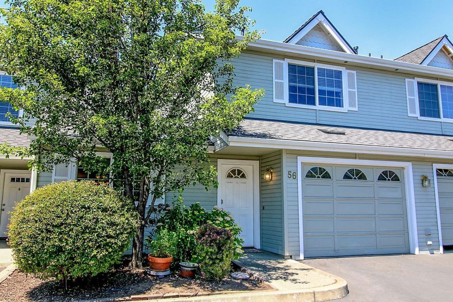 Don't miss out on this beautifully remodeled townhome in the desirable East Ridge Village. Enjoy maintenance free living with access to a beautiful pool and clubhouse. The home features an open floorplan with bright and cheery living room, vaulted ceiling, cozy gas fireplace and sliding glass door to private patio. It has a first floor master bedroom with private bath and walk in closet. The kitchen boasts newer stainless appliances including a gas stove, built in microwave and stainless steel dishwasher. The home has an attached single car garage for parking and extra storage and a reserve spot just outside the home. These units go fast so make your appointment today!