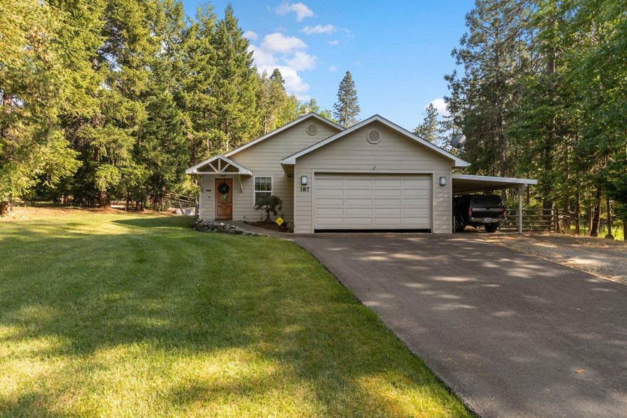 Gardeners Paradise, immaculate home on level .67 acres located in nice quiet neighborhood. Has a 2-car finished garage, unique barn finished w/full bathroom, storage, woodstove & workshop. This cute home was built in 2002 has 1200 sqft, 2 bedrooms, 2 bathrooms, kitchen w/cherry cabinets & tile floor, heat pump & natural gas fireplace.  Enjoy nature from your covered back porch, & fenced yard with inground sprinklers & park-like setting. 
Located in a nice quiet neighborhood.